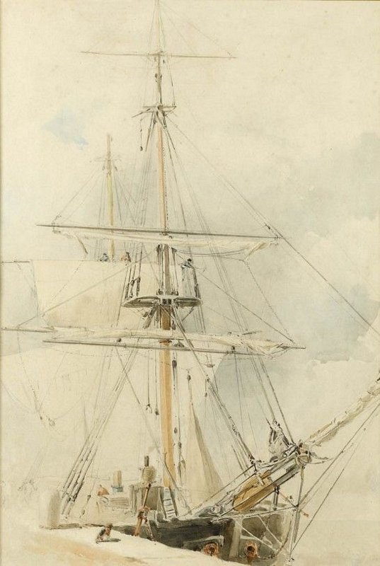 A ship in dock with sails half furled